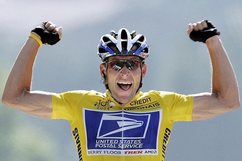 Lance Armstrong celebrating at the finishing line during the 2004 Tour de France. His seven Tour de France wins were voided for doping.