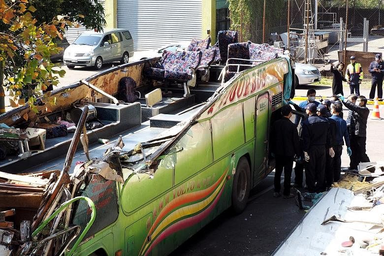 The top half of the bus, which was ferrying mostly senior citizens, was ripped off in the accident on Monday. The authorities have ruled out road conditions as the cause of the crash.