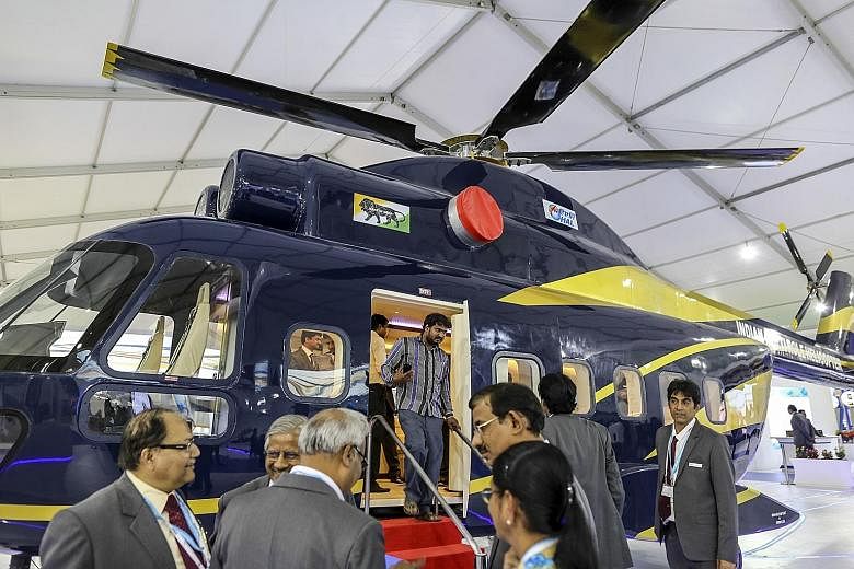 An Indian-made helicopter at the air show in Bengaluru this week.