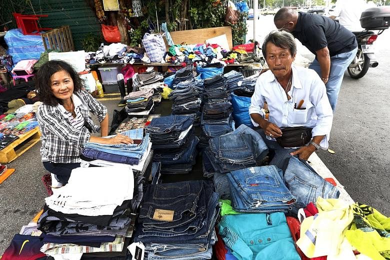 Mr Neo, who sells unwanted clothes, met his wife Madam Peh at the Sungei Road flea market. They have a daughter in Secondary 1.