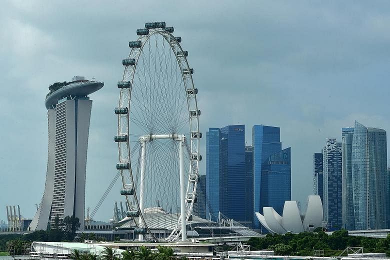 A small, open economy like Singapore's can ill afford to wait and see political and technological disruptions play out, economists say.