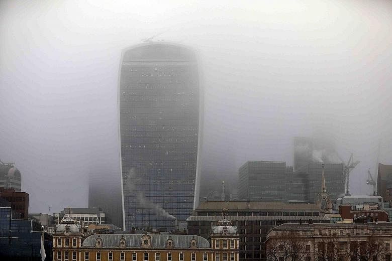 Fog shrouding 20 Fenchurch Street, also known as the Walkie-Talkie, in the City of London. London's poor air quality set a modern record at the end of last month, during a spate of pollution that occurred when cold, windless weather trapped emissions