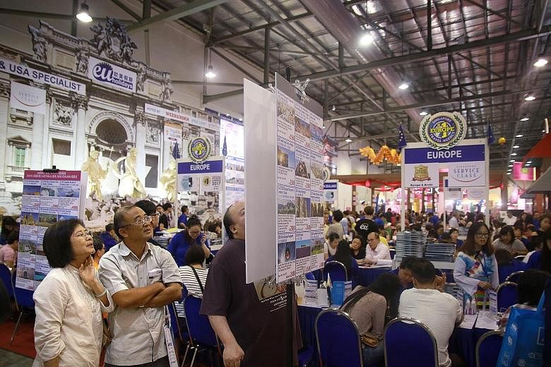 Visitors to the Natas travel fair last Saturday. The three-day event at the Singapore Expo ended yesterday. It was spread over 11/2 halls, as opposed to the usual one hall, and featured 600 booths, more than double the 291 last year. And entry was fr