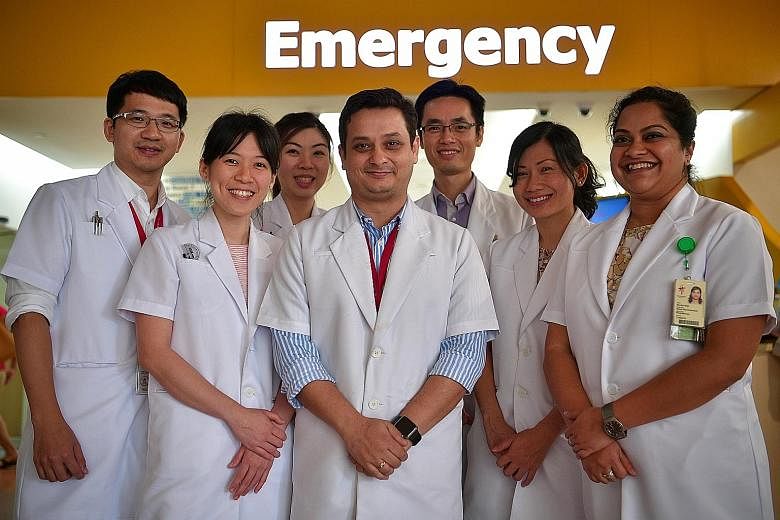 Physiotherapists (from far left) Ringo Yee, Ong Pei Gin, Christina Chia, Gadru Rahul, Jason Loh, Tee Lee Huan and Sharika Udipi are put on standby to treat patients at TTSH's A&E department. Over 900 patients at the hospital were treated under this p