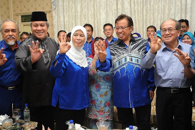 Ms Jamilah celebrating her landslide victory in the Tanjung Datu by-election with Sarawak Chief Minister Abang Johari Tun Openg (second from right) and other BN members last Saturday.
