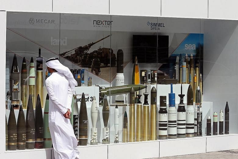 Munitions on display at the International Defence Exhibition and Conference in Abu Dhabi on Sunday. Countries in the Middle East now account for almost a third of the world's arms imports. One expert says that tensions in the region have kept the "ac