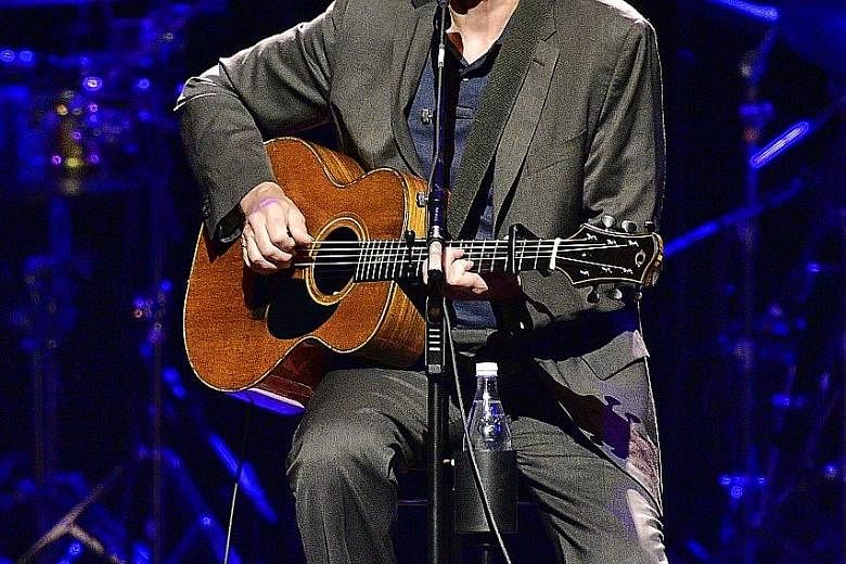 American singer-song- writer James Taylor's singing voice seems untouched by time.