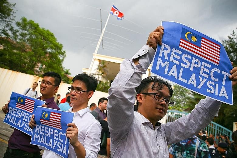 Barisan Nasional members rallying at the North Korean Embassy in Kuala Lumpur yesterday.