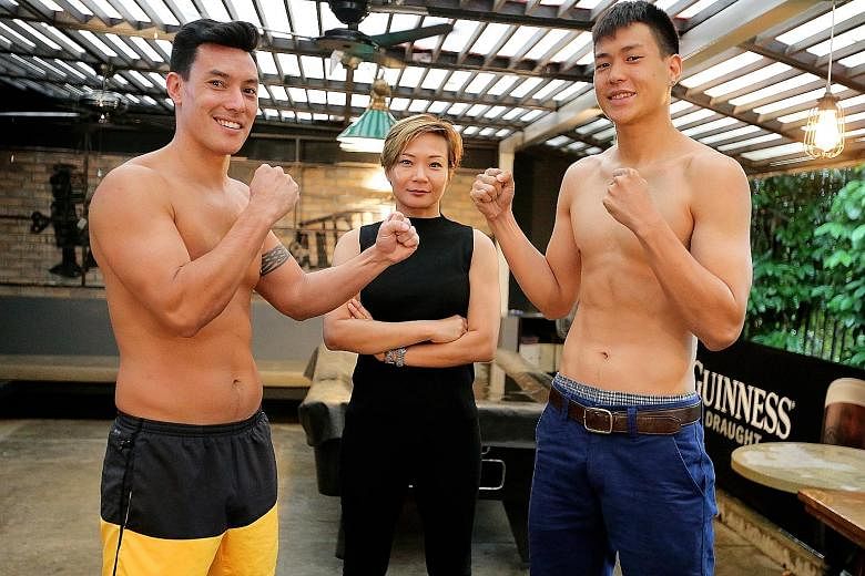 Anthony Musang (left), Arlene Lim, chief executive of Trifecta Martial Arts, and Terrence Teo at the weigh-in for Fight for Hope, a national kickboxing competition held for the first time at Trifecta Martial Arts in Turf Club Road today. Nine bouts w