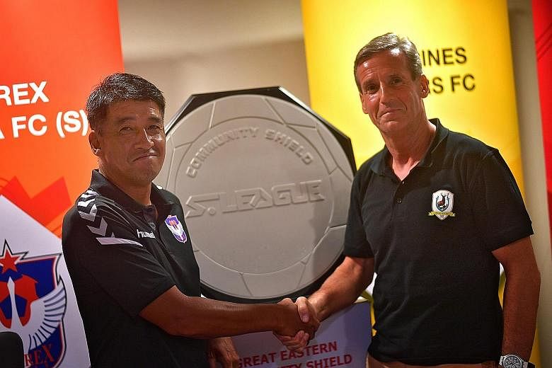 Albirex coach Kazuaki Yoshinaga and Tampines coach Jurgen Raab with the Community Shield their teams will contest tomorrow.