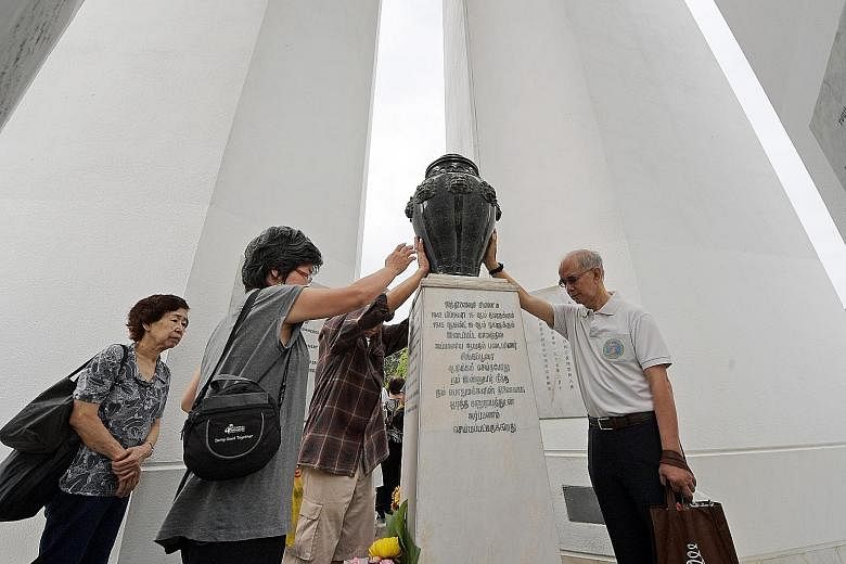 Bose arrived in Singapore in July 1943 to revitalise India's independence struggle. He urged Indians in Malaya and Burma to volunteer for the INA. Visitors paying their respects at the urn at the Memorial to the Civilian Victims of the Japanese Occup