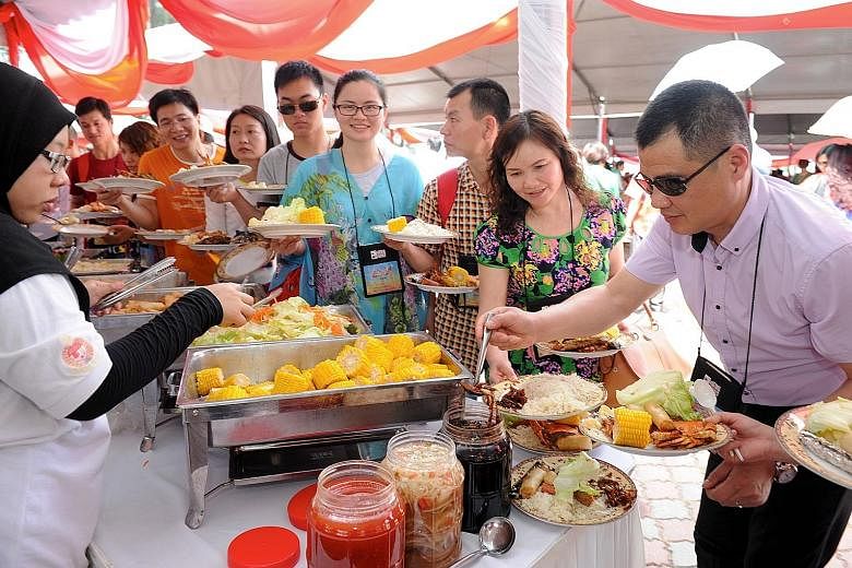 Visitors to Port Dickson at a buffet, under a programme aimed at Chinese tourists, in March last year.