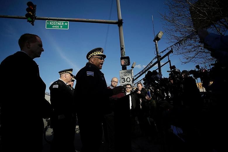 Chicago Police Superintendent Eddie Johnson with reporters at the scene of a triple shooting in the North Lawndale neighbourhood on Feb 14. Consultant and urban demographics expert Rob Paral said there have been many killings in Chicago, but the ra