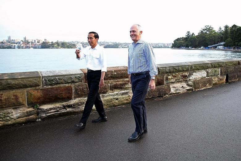 Mr Joko and Mr Turnbull sharing a lighter moment yesterday. The two leaders resolved to expand maritime cooperation, among other things.