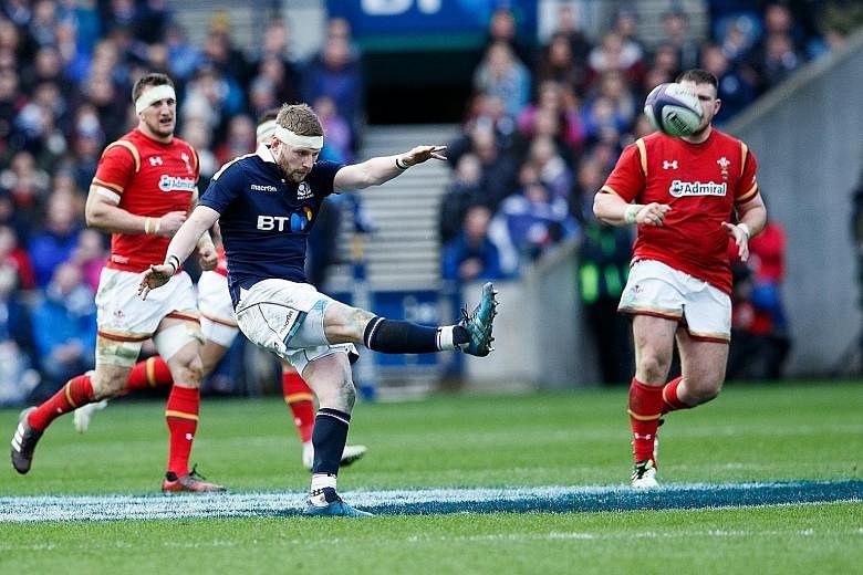 Fly-half Finn Russell's excellent dead-ball kicking contributed 19 points to Scotland's comeback 29-13 win over Wales.