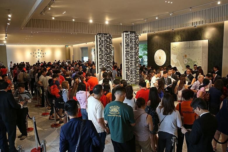 Potential buyers at the launch of the 505-unit The Clement Canopy in Clementi, which sold 195 units on the first weekend of its launch. Some buyers said they were attracted to the location and features such as the condo's lush landscaping.