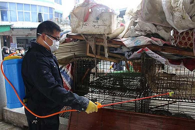 A poultry market in Jiangxi province being disinfected on Sunday as China steps up prevention measures against bird flu. Already, some live poultry markets have been closed after people and chickens were infected by the avian flu strains. China is th