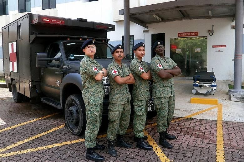 From left: Lt (Dr) Yap, 3SG Muhamad Nur Yassin, Cpl Muhammad Zakaria and Lance Cpl Adiram from Rocky Hill Medical Centre acted fast by performing emergency resuscitation on Mr Phua while he was being taken to SGH. Mr Phua had suffered a cardiac arres