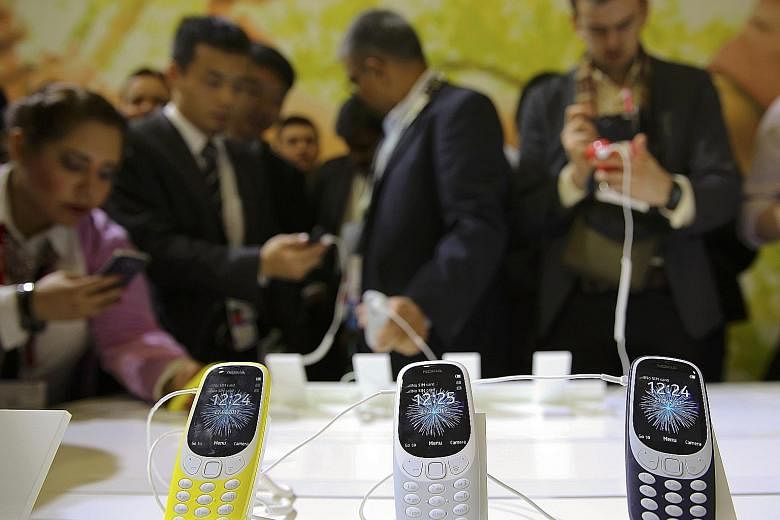 Display models of the relaunched Nokia 3310 at the Mobile World Congress in Barcelona, Spain. It is unlikely the Nokia 3310 will be sold in Singapore as all 2G networks in the country will close from April.