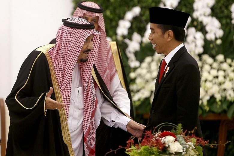 President Joko and King Salman at the presidential palace in Bogor yesterday. This is the first visit by a Saudi king to Indonesia in 47 years, and follows Mr Joko's visit to Riyadh in 2015.