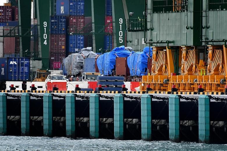 The SAF Terrex infantry carriers at Pasir Panjang container terminal in January after returning from Hong Kong.