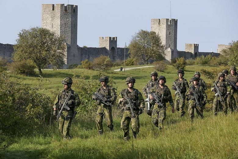 Around 13,000 young Swedish men and women born from 1999 will be called for enrolment from July 1, with at least 4,000 of them then chosen for compulsory military service starting next year.