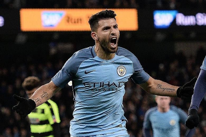 Man City striker Sergio Aguero celebrating his 73rd-minute goal and his side's fourth in the 5-1 FA Cup fifth-round replay rout over Championship team Huddersfield. City play away to Sunderland on Sunday in the Premier League as they aim to close the