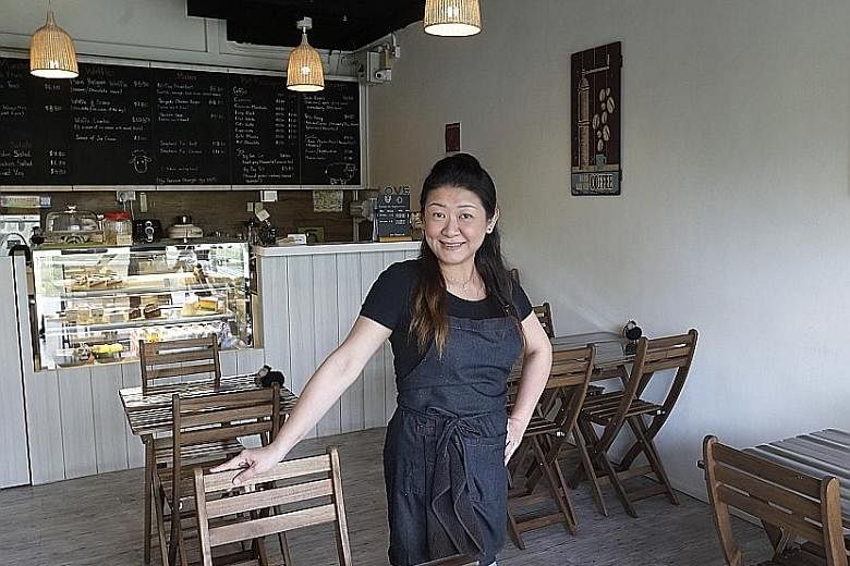 Madam Tan gets just one or two walk-in customers on some days at her cafe in Space @ Kovan. Only about a quarter of the 56 retail spaces at the strata-titled mall have been leased out, nearly two years after it opened.