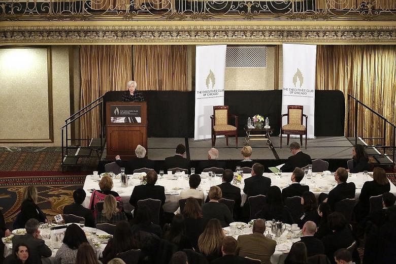 Fed chair Janet Yellen speaking at an Executives Club of Chicago luncheon last Friday. She has added to the certainty of an interest rate hike this month by saying that it will be "appropriate" to do so in the upcoming Fed meeting on March 14 and 15.