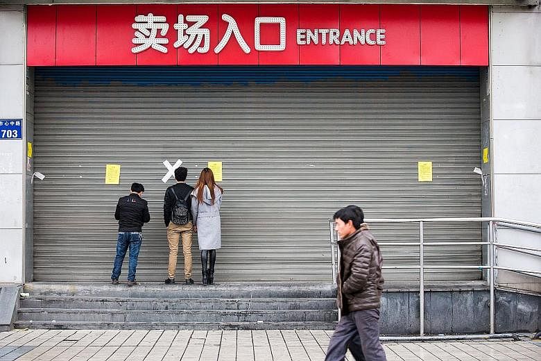 A closed Lotte Mart outlet in Hangzhou, Zhejiang, on Sunday. Although workers at some outlets say the closures were related to fire safety, the shutdowns are seen as the latest in a series of incidents affecting South Korean firms in China because of