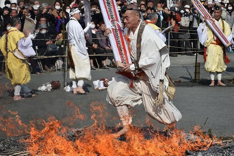 The fire-walking festival known as Nagatoro Hi-Matsuri was marked on Sunday at the Fudoji temple in Nagatoro town, Saitama prefecture, to herald the coming of spring. Hundreds of Buddhist devotees participated in the festival to purify the mind and b