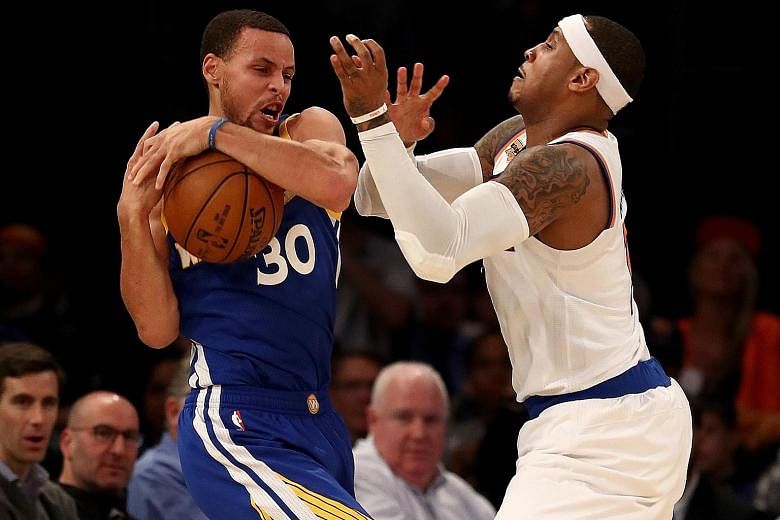 Golden State's Stephen Curry relieving New York's Carmelo Anthony of the ball during the Warriors' win over the Knicks. It was Golden State's first win on their five-game road trip, and also their first since Kevin Durant's injury.