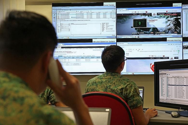 A simulated cyber attack at Mindef's Cyber Test and Evaluation Centre last month. Singapore, like any other sovereign nation, faces unprecedented cyber risks that can only increase. To tackle such challenges, we have to think outside the box and reco