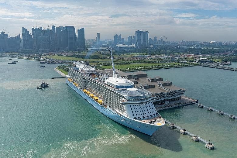 The marketing partnership will promote cruising out of Singapore on Royal Caribbean's ships Ovation of the Seas (above, at Marina Bay Cruise Centre) and Voyager of the Seas. The ships can accommodate 4,905 guests and 4,269 guests respectively, and ar
