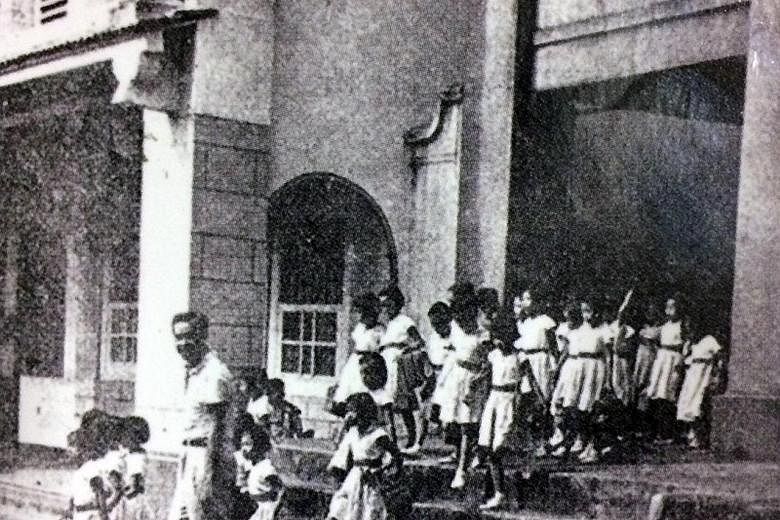The school in Chinatown in the 1950s. Above: Dr Ho Nai Kiong, a retired paediatrician and former student of Yeung Ching School, started researching for his book, Records Of Old Yeung Ching, in 2005.