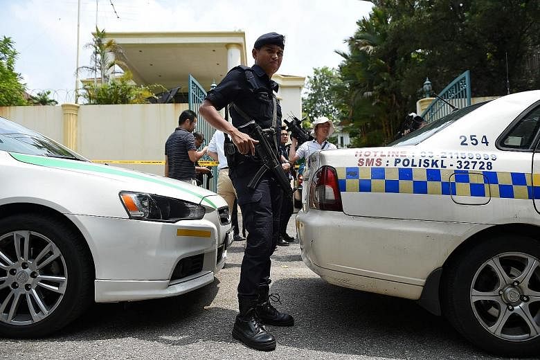 The North Korean Embassy cordoned off in Kuala Lumpur yesterday, with police stationed outside. Malaysia's move came after its own diplomats were prevented from leaving their embassy in Pyongyang.