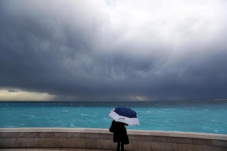 Winds gusting up to hurricane force battered west and central France on Monday, leaving two people dead and 600,000 homes without electricity, the authorities said. Storm Zeus - named after the paramount god in Greek mythology - hit the Atlantic coas