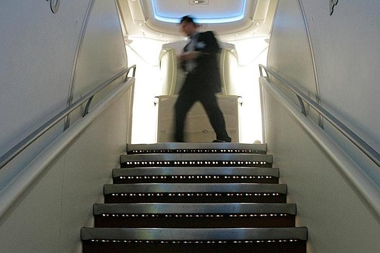 The A-380's sweeping, double staircase is one of the first features passengers see when boarding the plane.