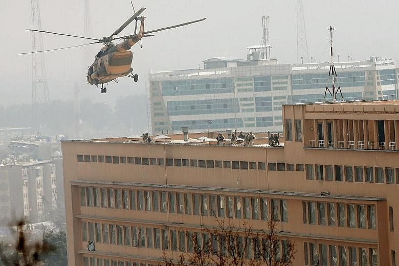 Afghan special forces soldiers used helicopters to mount a counter-attack at the Sardar Mohammad Daud Khan hospital from the roof. Some patients climbed out of the building and could be seen sheltering on window ledges. Away from Kabul, the country h