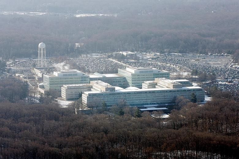 It was not immediately clear if the CIA - whose headquarters (left) is in Langley in Virginia - had sent a crimes report to the Justice Department, a formal mechanism alerting law enforcement agencies of a potentially damaging and illegal national se