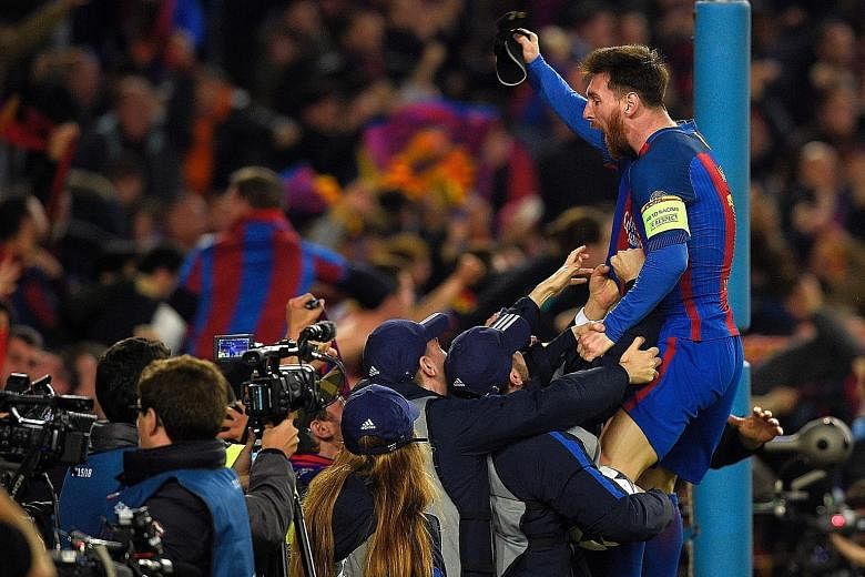 Barcelona's Lionel Messi celebrating their improbable 6-1 victory over PSG at Camp Nou to go through to the quarter-finals of the Champions League, 6-5 on aggregate.