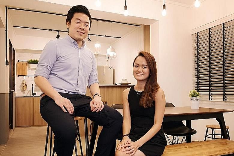 A countertop kitchen with bar stools, for extra seating; and an altar fashioned out of a shelf are among the features in the home of Mr Daniel Kor and Ms Lim Shuhui (both above).