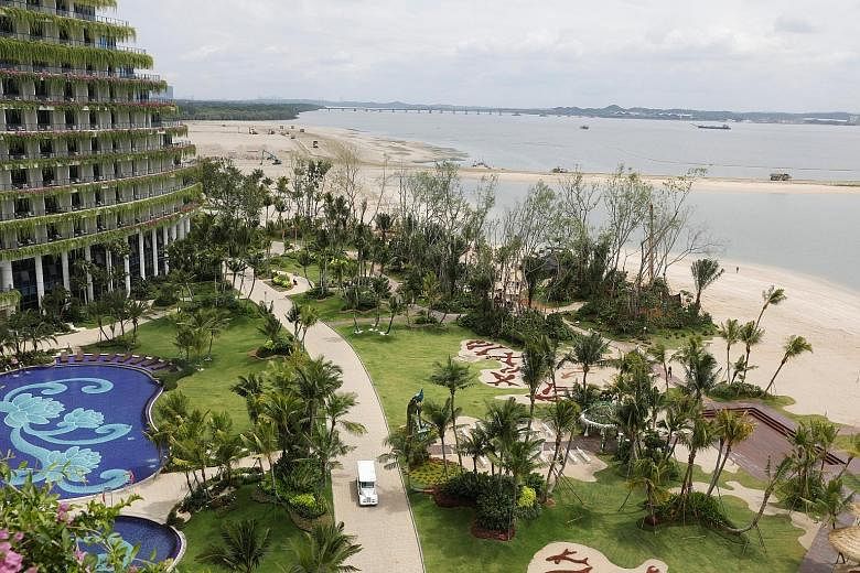 Land reclamation next to a hotel in Country Garden's Forest City project in Johor Baru. The company says it is overhauling its Chinese sales centres "to better fit with current foreign exchange policies and regulations", and as part of its shift to a