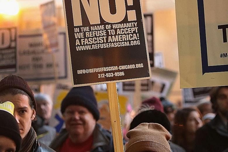 Protesters demonstrating against President Trump in Chicago. Recent analysis shows that support for democracy in the US and Europe has declined over the last 20 years in almost every age group, with the young the most sceptical.
