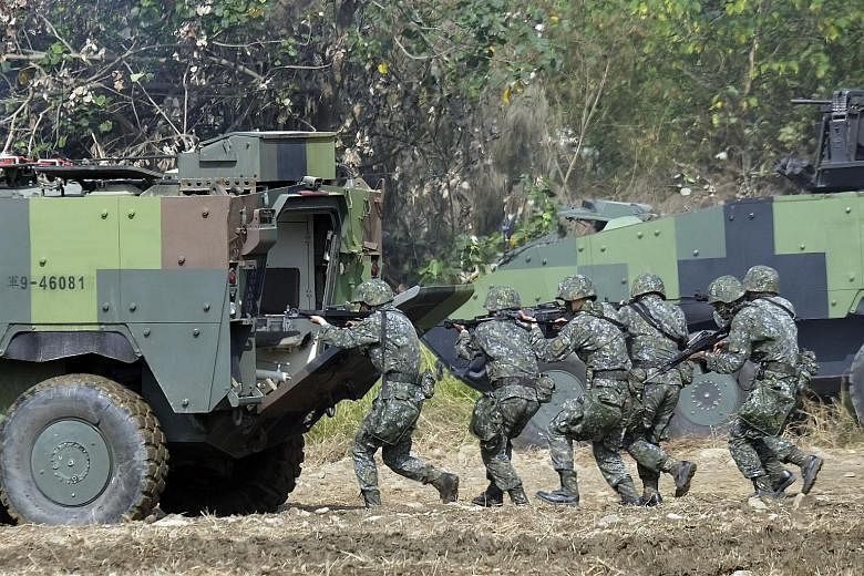 Taiwan special forces during an annual military drill in Taichung. Troops should hone their expertise in cyber warfare, say experts.