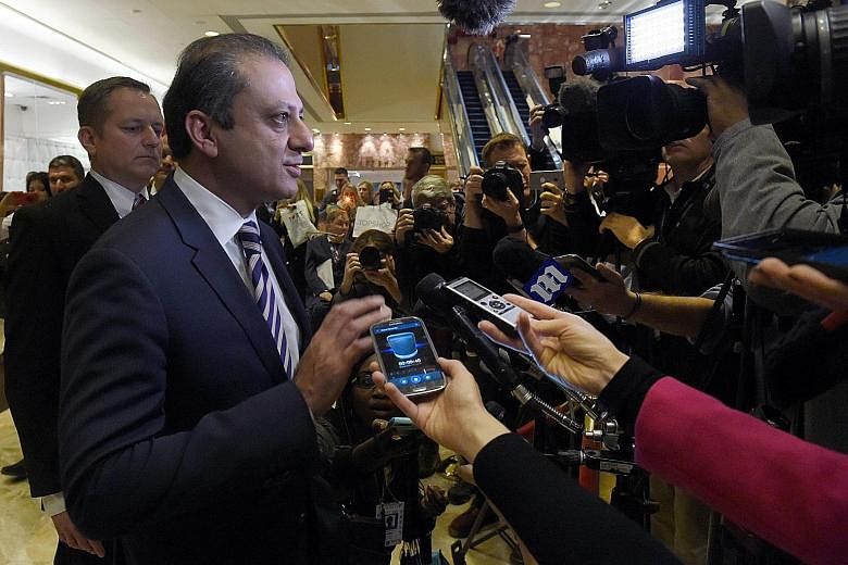 Mr Bharara at Trump Tower last November. He told reporters at the time that Mr Trump had asked him to stay on as US Attorney for the Southern District of New York, but was reportedly forced out of the job over the weekend.