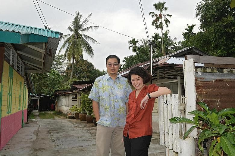 Poet Aaron Lee and writer and teacher Christine Chia, seen here in Kampung Lorong Buangkok, are the editors of a local poetry anthology commissioned by MOE and tentatively titled Lines Spark Code. Schools can use it to teach practical criticism skill