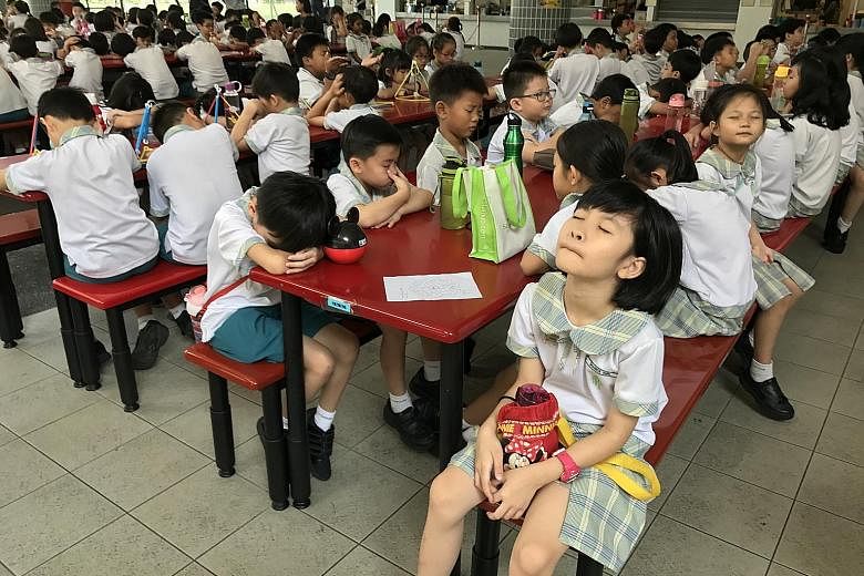 Pupils at Westwood Primary School in Jurong West participate in a "mindful breathing" session in the canteen towards the end of recess every day. These two-minute-long guided breathing sessions were officially introduced in January to help pupils bet