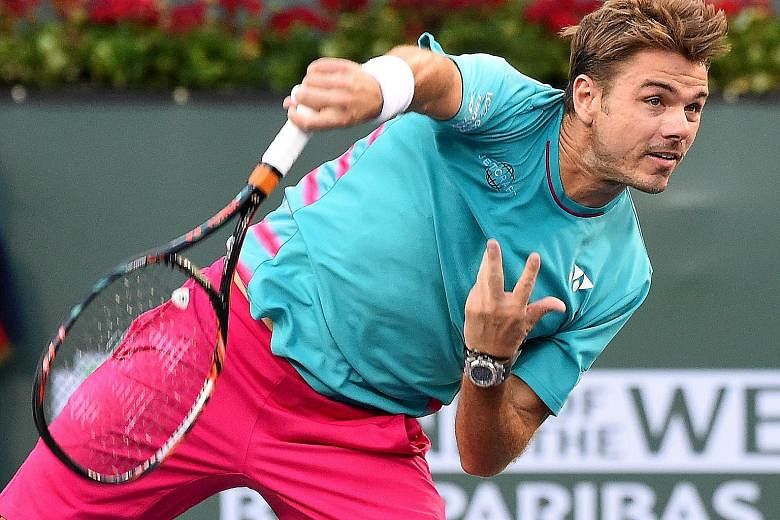 Stan Wawrinka serving to German Philipp Kohlschreiber at Indian Wells. The Swiss had seven aces and did not face a single break point en route to his 7-5, 6-3 victory.