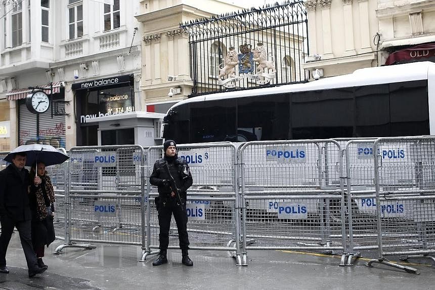 A riot policeman guarding the Dutch consulate in Istanbul on Monday. The Netherlands became embroiled in a row with Turkey after it prevented two Turkish ministers from holding rallies in the country.